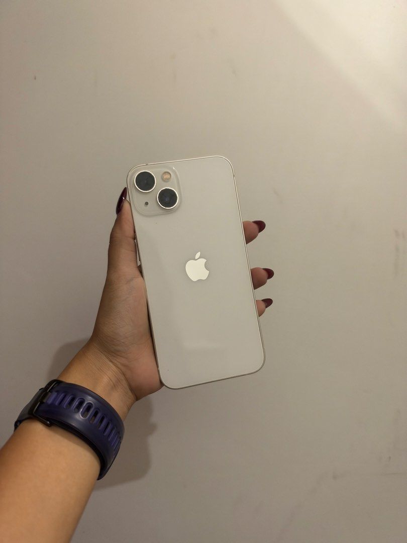 iPhone 13 Starlight 128gb (Category: iPhone 13 Series) located in Guiguinto. Submitted by tmthylzn (Listing ID 1470727306, Image 1). Description: Smartlocked and NTC Approved 72% Battery Health Issue: paint chips UNIT & CORD ONLY! Location: Quezon City.