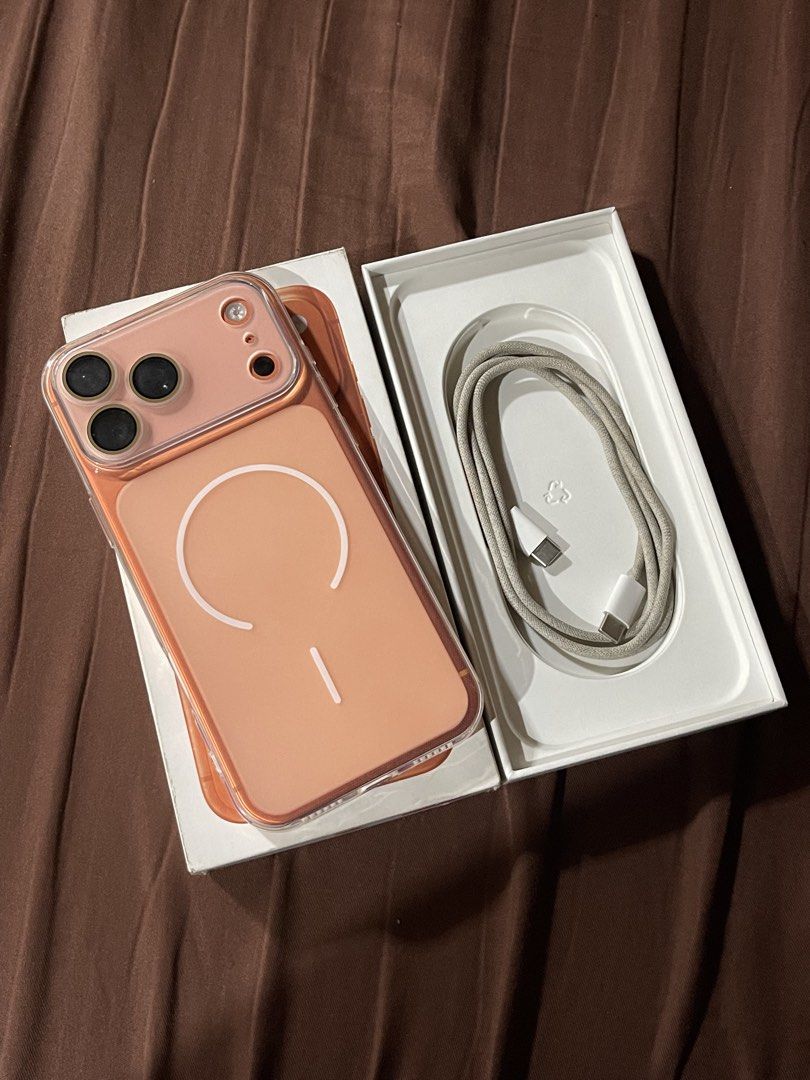 iPhone 17 Pro Max 256gb Cosmic Orange (Category: iPhone 17 Series) located in Valenzuela. Submitted by amdps (Listing ID 1470628663, Image 1). Description: iPhone 17 Pro Max 256gb Openline to any sim NTC 92% battery health🧡🧡 with orig box and cord.