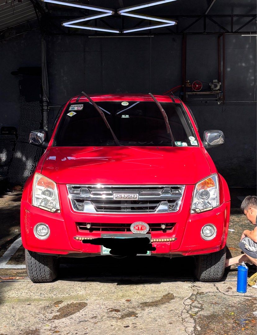 Isuzu D-Max (Category: Used Cars) located in Quezon City. Submitted by mr.kalmado (Listing ID 1470690448, Image 1). Description: 🚘 FOR SALE: 2010 ISUZU D-MAX 3.0 DIESEL A/T | 4x2 DOUBLE CAB 💰 ₱375,000 — Negotiable ✅ 180,000 km | New Battery ✅ Red | Automatic | 3.0L Diesel ✅ Bank encumbrance cleared and verified 🔎 Recently washed. Has front bumper scuffs, interior wear, and minor issues. Inspection and test drive welcome. 📍 QC / Marikina area 