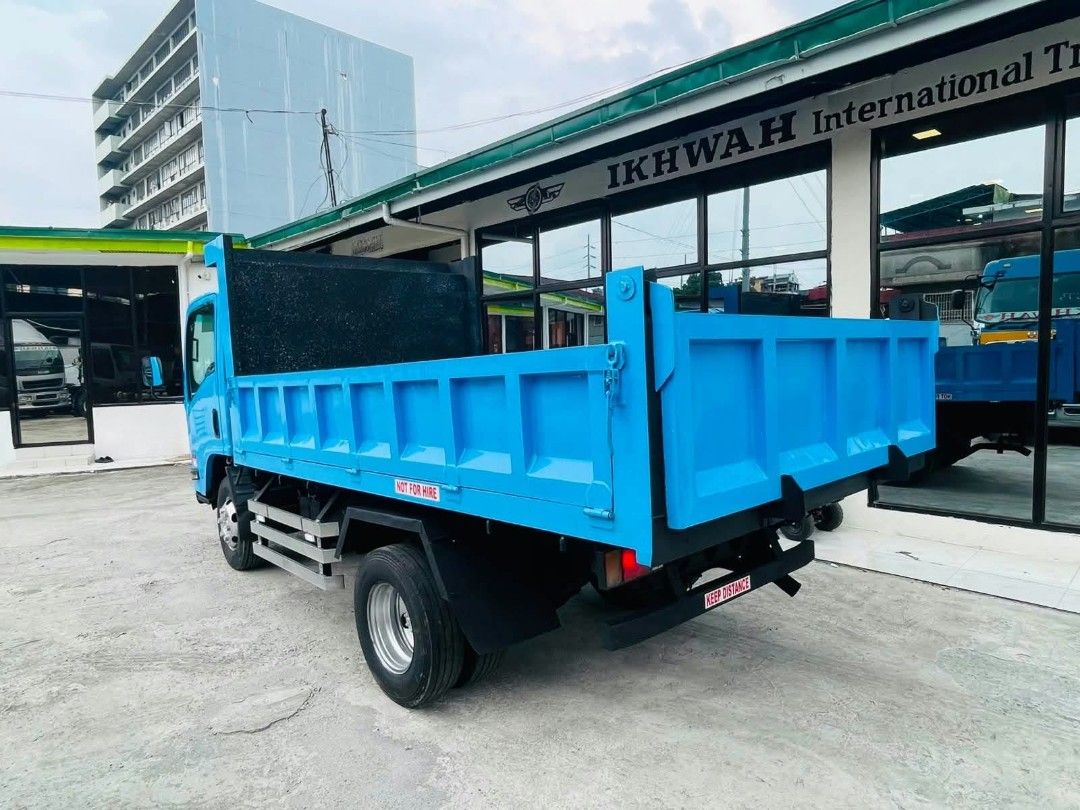 Isuzu Elf Minibus (Category: Heavy Vehicles) located in Quezon City. Submitted by nikkoandrew (Listing ID 1470623605, Image 2). Description: Isuzu Elf N series Dump truck Engine:4hk1 euro4 Model:2026 Body type:mini dump truck Gross weight:4200 (no truck) Original moyle Unit comes with a good tires New battery New upholstery Fully aircon.