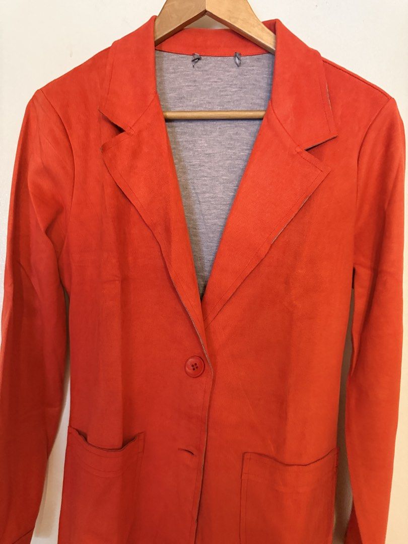 Italian Suede Winter Long Jacket (Category: Coats, Jackets and Outerwear) located in Manila. Submitted by amdra25 (Listing ID 1470577328, Image 2). Description: - Color: Red - Material: suede (lightweight) - Features: Structured lapels, front button closure, two functional pockets - Style: Statement piece, versatile use - Condition: Excellent, clean edges with no stains or fading Bought in Milan.