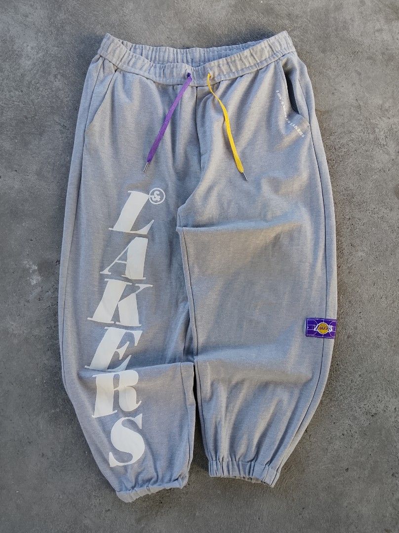 Jack & Jones NBA LAKERS Big Script Pants (Category: Joggers) located in Manila. Submitted by gowicollection28 (Listing ID 1470664892, Image 1). Description: Waist: 33-42 Length: 37.