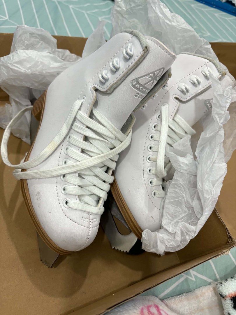 Jackson 200 Figure Skates Shoes (Category: Skates, Rollerblades & Scooters) located in Manila. Submitted by jaychiiiii (Listing ID 1470571565, Image 3). Description: - Brand/Model: Jackson 200 figure skates (White) - Included: White laces and original shoe box - Blades: Securely attached stainless steel blades with visible size mark near the heel - Condition: Minor scuffs on the toe area from past use, otherwise well-maintained.