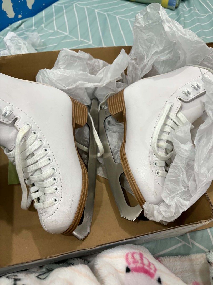 Jackson 200 Figure Skates Shoes (Category: Skates, Rollerblades & Scooters) located in Manila. Submitted by jaychiiiii (Listing ID 1470571565, Image 2). Description: - Brand/Model: Jackson 200 figure skates (White) - Included: White laces and original shoe box - Blades: Securely attached stainless steel blades with visible size mark near the heel - Condition: Minor scuffs on the toe area from past use, otherwise well-maintained.