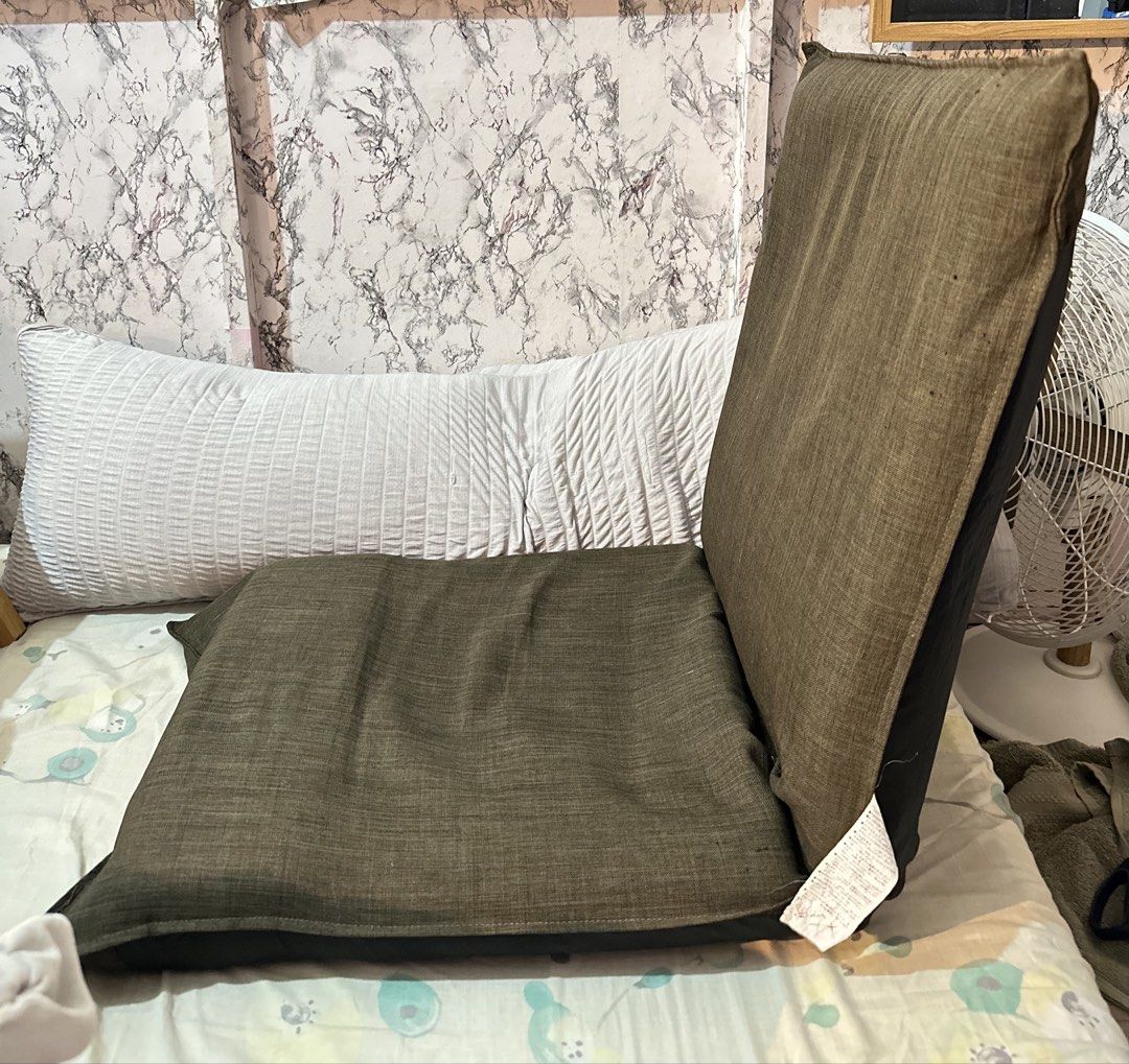 Japanese Tatami Chair (Category: Chairs) located in Pasay City. Submitted by kirayychii (Listing ID 1470726774, Image 2). Description: • Bought in Japan Surplus • Has a minor scratches on the left side of the seat (shown in photo) • Washed and cleaned cover • Can be used as flat bed • Price is still negotiable Location: Pasay City near LRT-1 Libertad Station Shipping: Laamove, Angkas, J&T or any preferred courier shouldered by buyer..