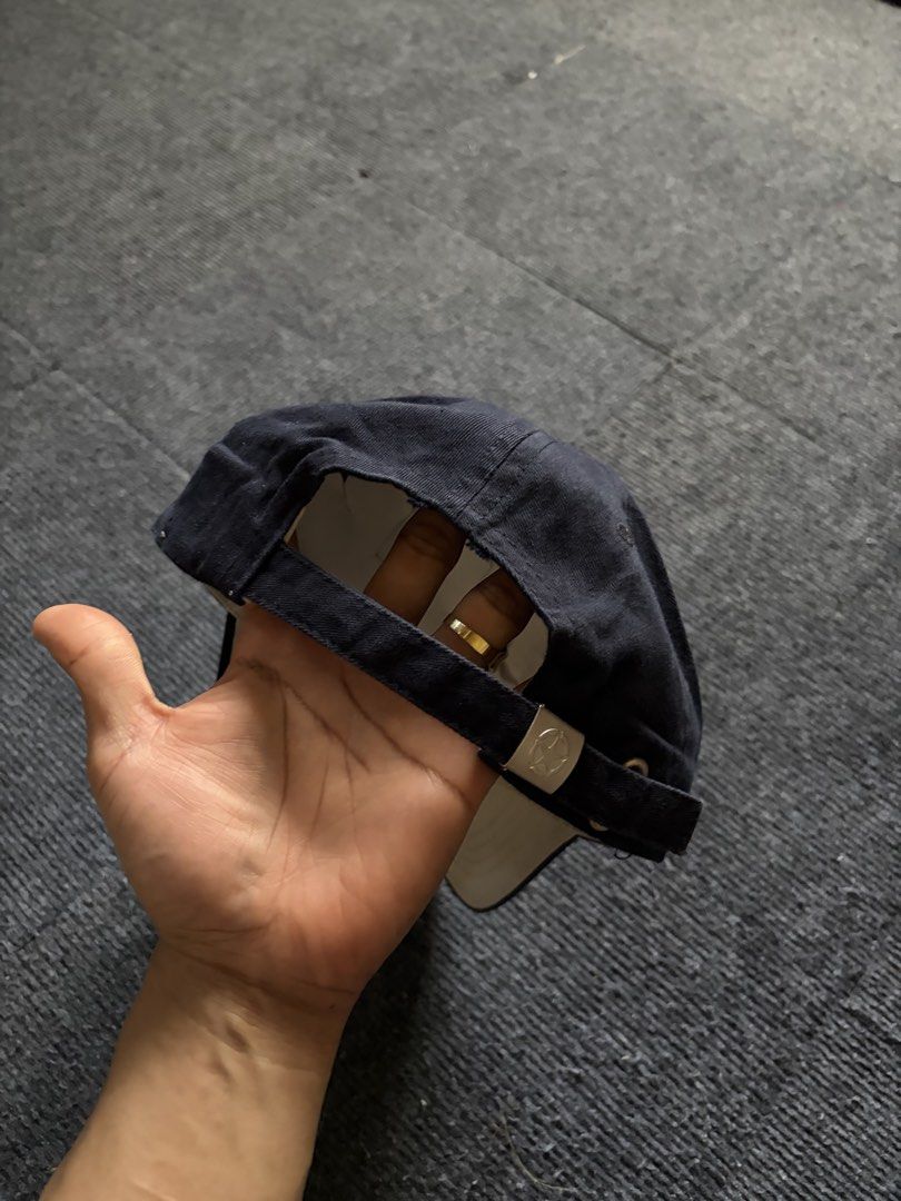 Jeep Legend Navy Blue Baseball Cap (Category: Caps & Hats) located in Manila. Submitted by toys_hats005 (Listing ID 1470628518, Image 2). Description: - Brand: Jeep Legend - Color: Navy blue - Design: Embroidered star and '1941' patch on front - Material: 100% cotton - Fit: Adjustable strap with metal buckle - Details: Contrast white brim lining, green inner tag (Made in China) - Condition: Excellent / Pre-loved - Shipping or meetups available (M