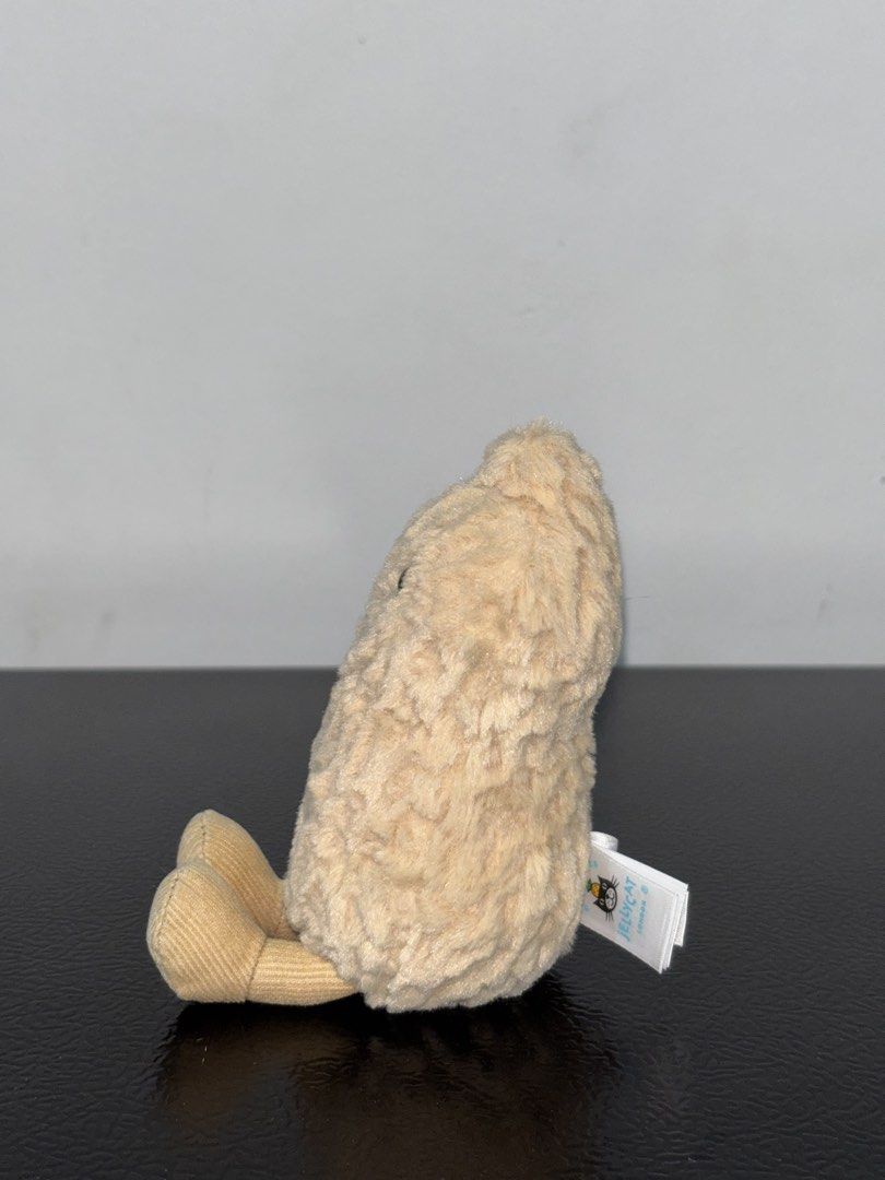 Jellycat Amuseables Peanut Plush Stuffed Toy (Category: Plushies & Soft Toys) located in Cavite. Submitted by eleanordc (Listing ID 1470726497, Image 2). Description: - Item: Jellycat Amuseables Peanut plush toy - Condition: Clean, well-maintained, and comes with the official tag attached - Features: Super soft textured fur, embroidered smiley face, and signature corduroy feet - Perfect for: Thoughtful gifts or a cute desk companion - Fulfillment