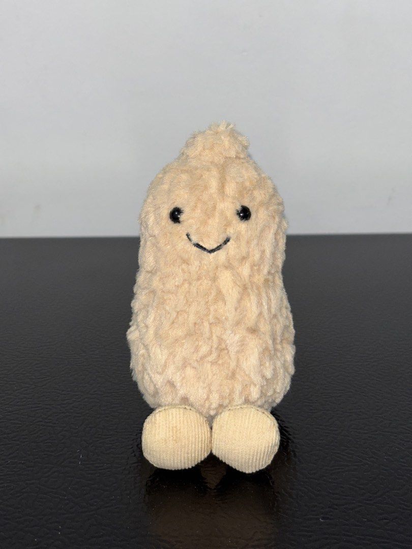 Jellycat Amuseables Peanut Plush Stuffed Toy (Category: Plushies & Soft Toys) located in Cavite. Submitted by eleanordc (Listing ID 1470726497, Image 1). Description: - Item: Jellycat Amuseables Peanut plush toy - Condition: Clean, well-maintained, and comes with the official tag attached - Features: Super soft textured fur, embroidered smiley face, and signature corduroy feet - Perfect for: Thoughtful gifts or a cute desk companion - Fulfillment