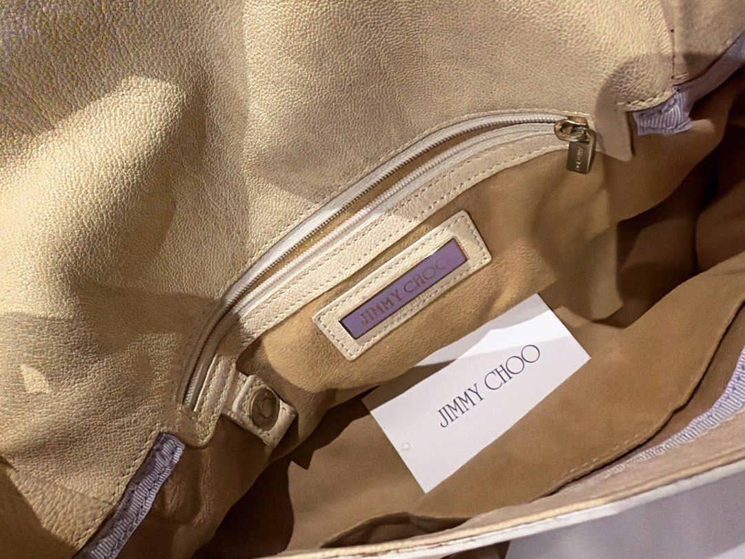 Jimmy Choo Tulita (Category: Luxury Bags & Wallets) located in Santa Rosa. Submitted by cartoflara (Listing ID 1470597901, Image 3). Description: Jimmy Choo Tulita Bag - nga / not thrifted (sourced online) - 7/10 condition - rare find, has discolorations but di halata - signs of use - Suede interior Negotiable but no to lowball offers Loc: Santa Rosa Laguna .