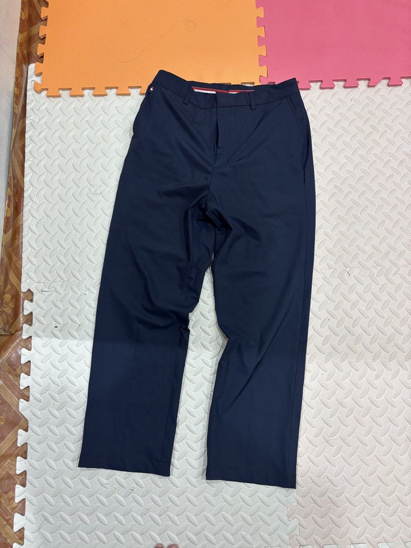j.lindeberg W Key Micro Stretch Navy Pants Size 34 (Category: Trousers) located in Manila. Submitted by noribrahim.20 (Listing ID 1470694273, Image 1). Description: - Brand: J.Lindeberg (Model: W Key Micro Stretch) - Color: Navy blue - Size: 34 - Material: 100% polyester - Fit: Standard straight cut - Features: Dual back welt pockets, small logo tab, signature tricolor red, white, and blue interior waistband tape - Condition: Clean, minimal wear 