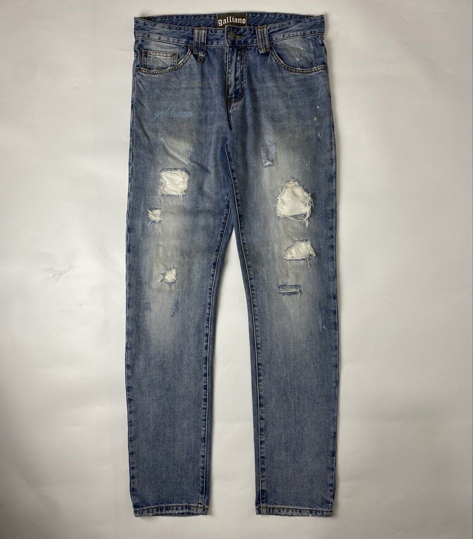 John Galliano 2000s Distressed Light Wash Jeans (Category: Jeans) located in Bacolod City. Submitted by rewear.conceptual (Listing ID 1470709612, Image 1). Description: John Galliano 2000s Distressed Light Wash Jeans Condition: 9/10 Color rate: 9/10 Tagged as: 33 Waist: 33 Length: 43.5 Leg opening: 6.5 Inseam: 32 Front rise: 10.5 Thigh: 11 Knee: 8.
