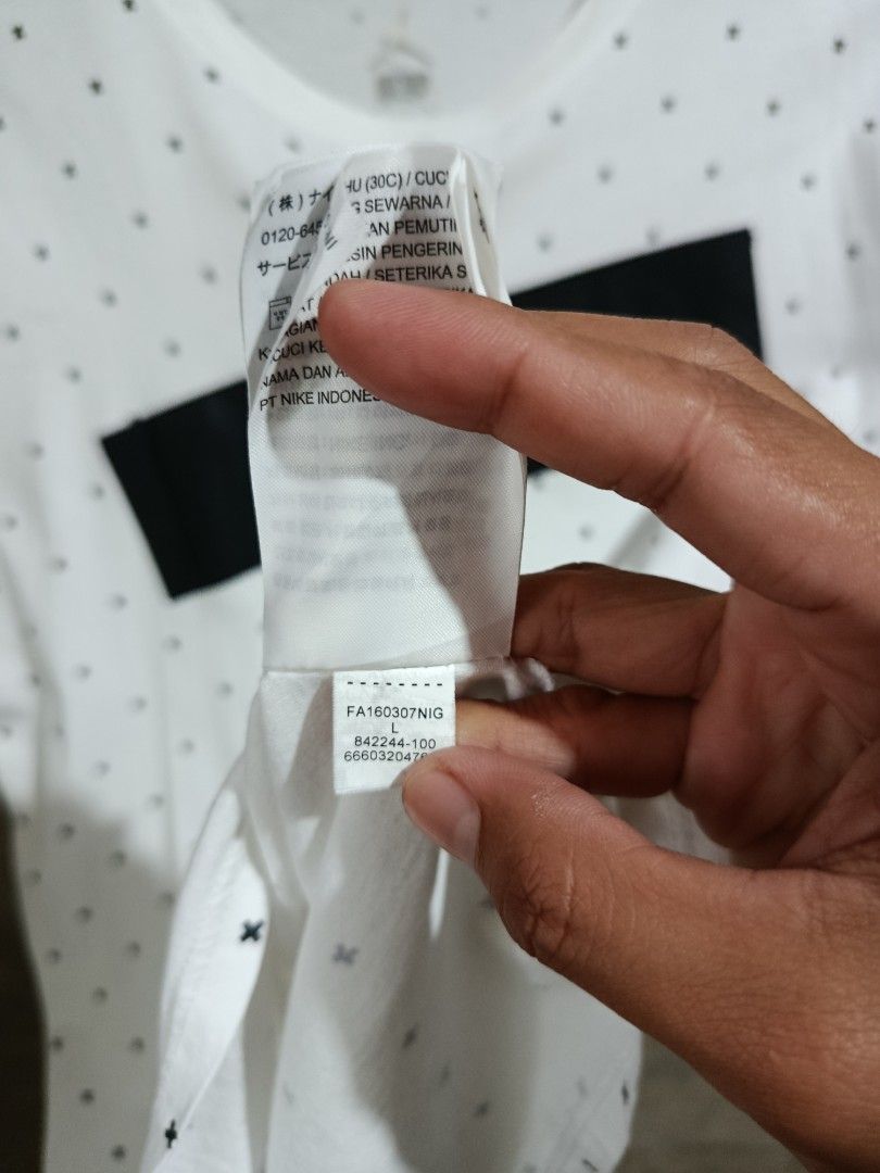 Jordan Banned White Cross Pattern Tee Large (Category: Tshirts & Polo Shirts ) located in Kalamansig. Submitted by skone1996 (Listing ID 1470618744, Image 3). Description: - Brand: Jordan - Color: White with black all-over cross print - Design: Bold raised 'BANNED' graphic on chest, small Jumpman logo on back collar - Size: Large - 21 Width - 27 Length - 9.8/10 Color rate - Issue Stain nasa two last pic . - Condition: Clean fabric, great for dail