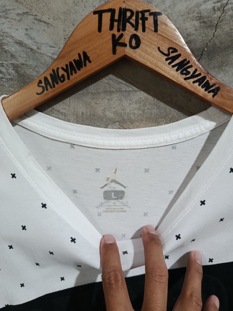 Jordan Banned White Cross Pattern Tee Large (Category: Tshirts & Polo Shirts ) located in Kalamansig. Submitted by skone1996 (Listing ID 1470618744, Image 2). Description: - Brand: Jordan - Color: White with black all-over cross print - Design: Bold raised 'BANNED' graphic on chest, small Jumpman logo on back collar - Size: Large - 21 Width - 27 Length - 9.8/10 Color rate - Issue Stain nasa two last pic . - Condition: Clean fabric, great for dail