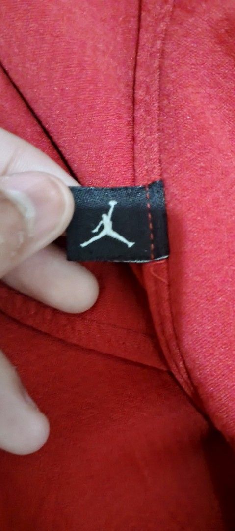 Jordan Dri-FIT Red Athletic Sweatpants Size S (Category: Joggers) located in San Juan City. Submitted by blueyohomeboy (Listing ID 1470688540, Image 3). Description: - Brand: Jordan - Color: Bright Red - Size: Small (S) - Material/Tech: Lightweight and breathable Dri-FIT technology - Features: Elastic waistband with adjustable drawstring, ankle zippers for easy on/off - Branding: Subtle Jordan Jumpman logo on left leg and small tag on side pocket