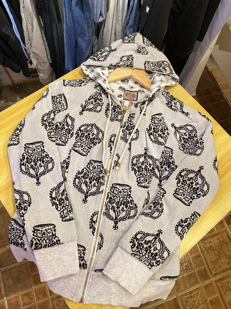 Juice Couture Crown (Category: Coats, Jackets and Outerwear) located in Manila. Submitted by thriftvibes324 (Listing ID 1470695868, Image 1). Description: - Brand: Juicy Couture - Color: Light grey with all-over black crown pattern - Size: L - Material: Cotton and polyester blend (machine washable) - Features: Zip-up front, drawstring hood, ribbed cuffs and hem - Condition: Excellent.