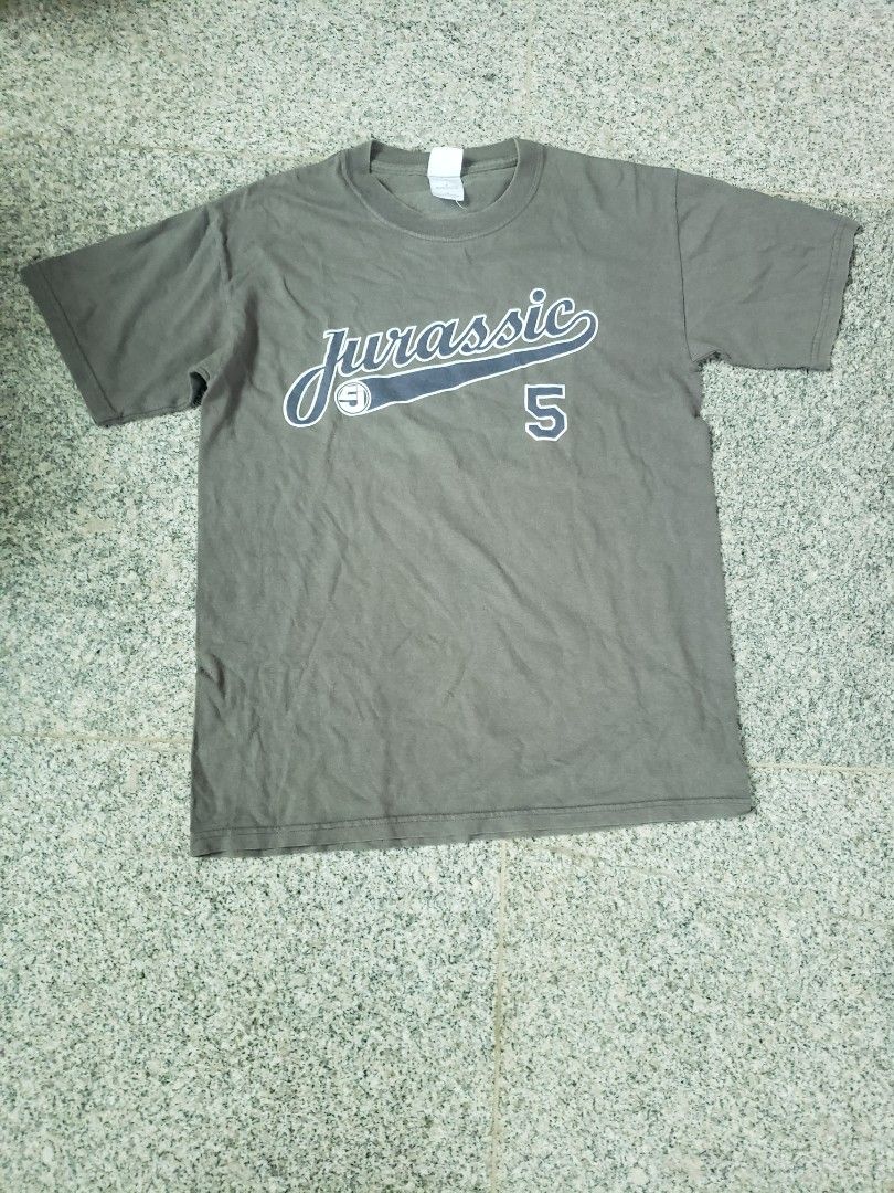 Jurassic 5 Vintage Graphic Tee Grey (Category: Tshirts & Polo Shirts ) located in Pagsanghan. Submitted by yuchinz (Listing ID 1470658966, Image 1). Description: - Authentic Jurassic 5 merch in versatile grey - Bold graphic print on the front and number 5 on the back - Classic short sleeves and crew neck fit - Condition: Normal wear with minor print cracking - Flaw note: A few small pinholes near the upper back hem - Perfect for vintage streetwea