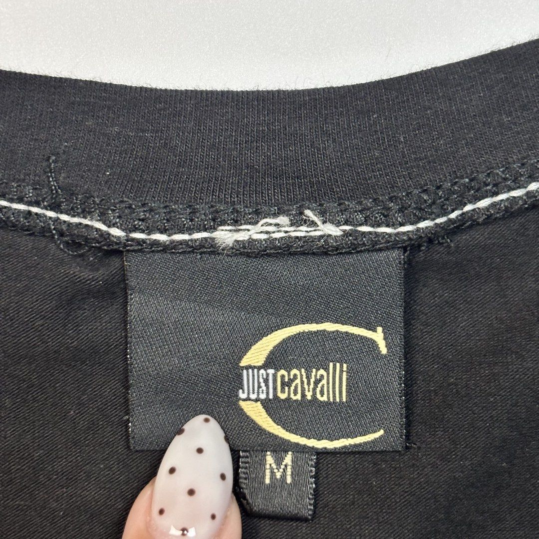 Just Cavalli Black Baby Tee (Category: Shirts) located in Bulacan. Submitted by citygirl00 (Listing ID 1470685964, Image 3). Description: in good condition medium on tag bust: 30, length: 19.