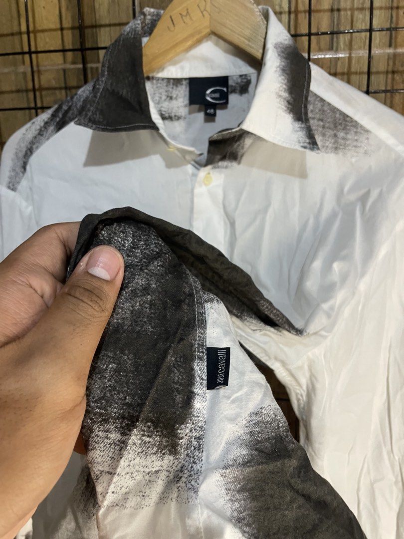 Just Cavalli button down shirt (Category: Luxury Apparel) located in Pateros City. Submitted by toogood.mnl (Listing ID 1470642250, Image 3). Description: Just cavalli button up shirt (Abstract design) W-20 L-28 No issue Excellent condition .