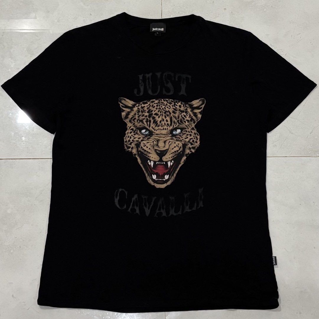 Just cavalli leopard graphic shirt (Category: Luxury Apparel) located in Cebu City. Submitted by florianmiral28 (Listing ID 1470670559, Image 1). Description: Just cavalli leopard graphic shirt Excellent condition Large W 21 L 28.5.