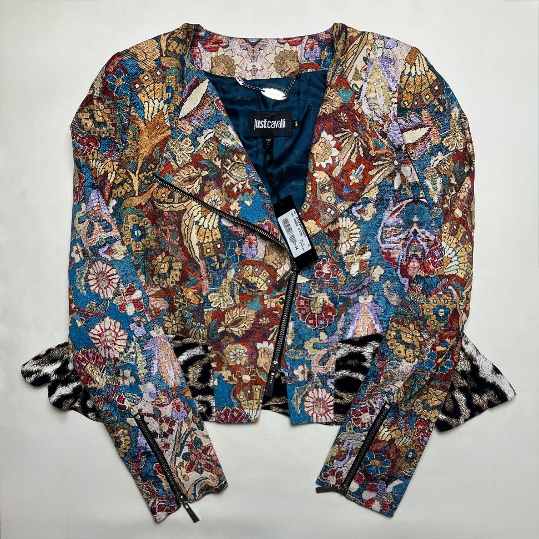 Just Cavalli Tapestry Print Biker Jacket Size 44 (Category: Coats, Jackets and Outerwear) located in Caloocan City. Submitted by achilles_grails (Listing ID 1470582828, Image 1). Description: - Brand: Just Cavalli - Condition: Brand new with original tags attached, unworn - Design: Vibrant tapestry pattern with contrast animal print hem - Fit & Style: Asymmetric front zip closure, structured shoulders, and zipped cuffs - Interior: Vibrant teal li