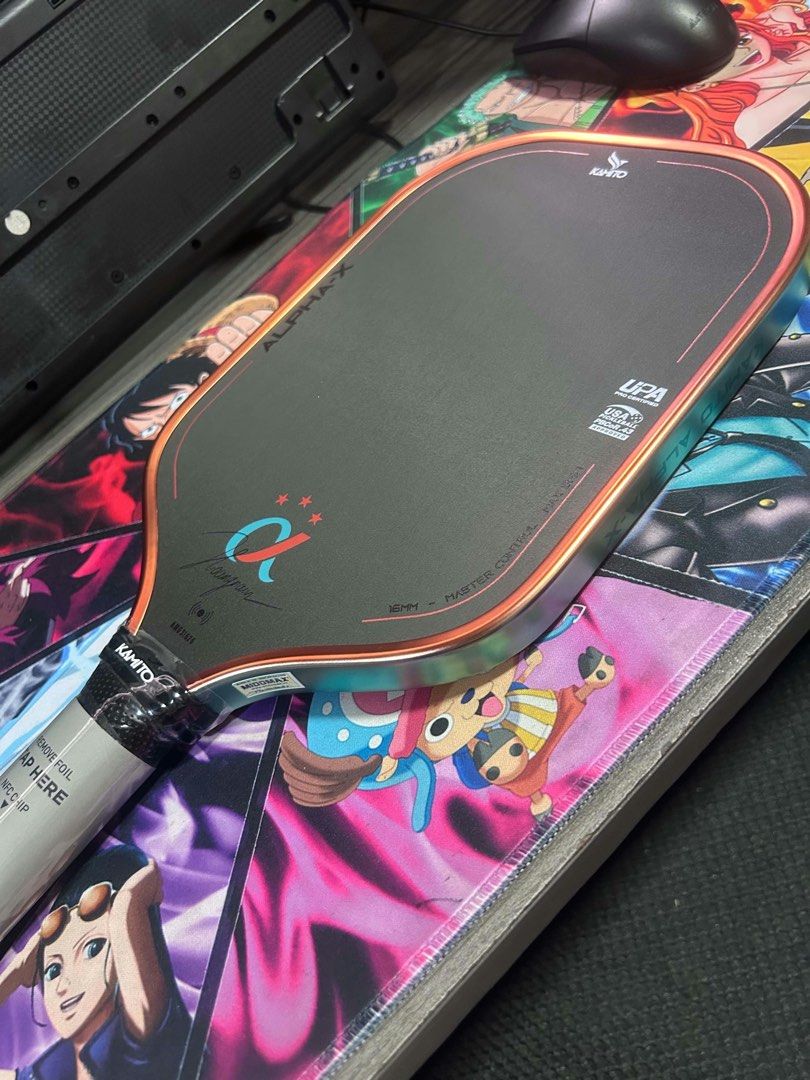 Kamito Alpha-X 16mm Pickleball Paddle (Category: Racket and Ball Sports) located in Taguig. Submitted by emmanuelfutaalan (Listing ID 1470590347, Image 1). Description: - Brand new Kamito Alpha-X pickleball paddle (16mm thickness) - USA Pickleball approved and UPA pro certified - Engineered for master control and maximum spin - Stylish iridescent shifting color finish on the edge guard - Factory wrap still intact on the handle, complete with NFC 