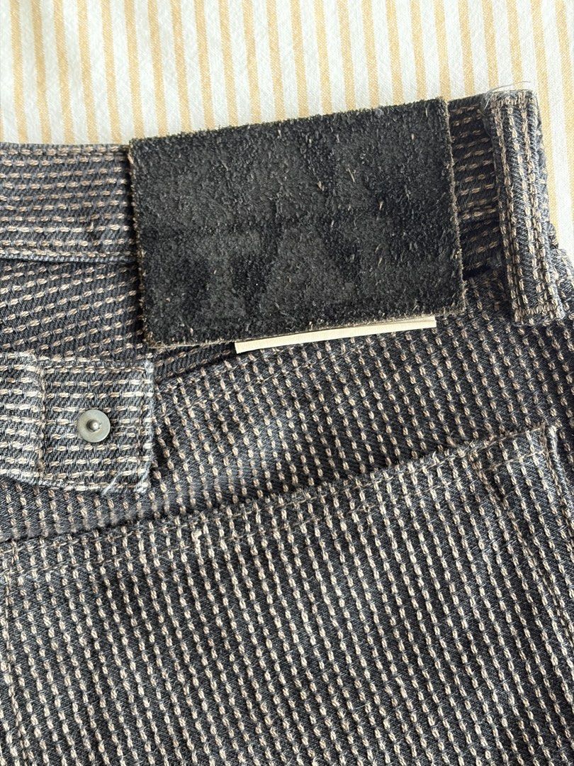 Kapital Century Denim Size 36 (Category: Jeans) located in Baguio. Submitted by expired_inventory (Listing ID 1470598270, Image 3). Description: - Brand: Kapital - Color: Dark charcoal with all-over textured pattern - Size: 36 (tagged on inner pocket and back waist patch) - Material: 100% cotton, Made in Japan - Details: Button fly closure, back cinch strap, and suede leather back patch - Condition: Excellent Dm for more information.