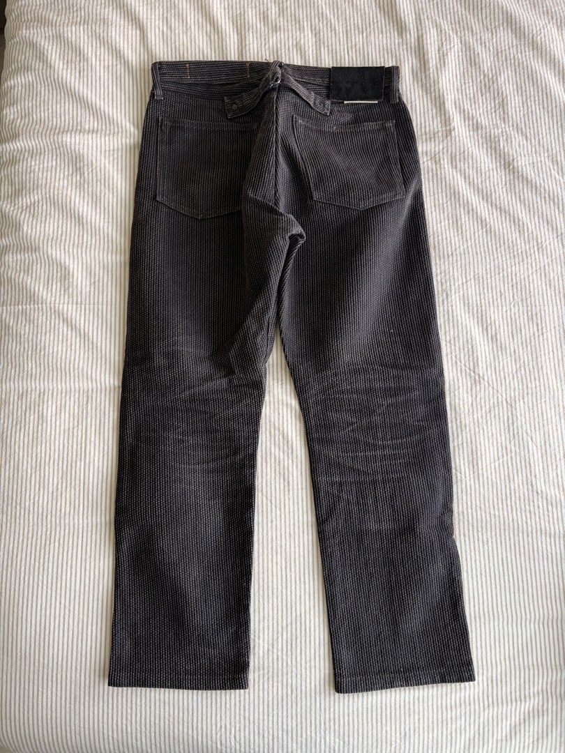 Kapital Century Denim Size 36 (Category: Jeans) located in Baguio. Submitted by expired_inventory (Listing ID 1470598270, Image 2). Description: - Brand: Kapital - Color: Dark charcoal with all-over textured pattern - Size: 36 (tagged on inner pocket and back waist patch) - Material: 100% cotton, Made in Japan - Details: Button fly closure, back cinch strap, and suede leather back patch - Condition: Excellent Dm for more information.