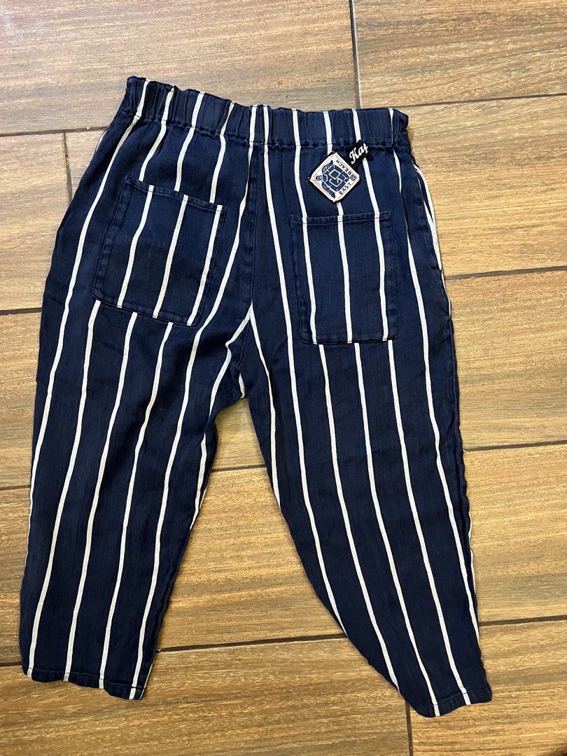 Kapital Easy Beach Go Pants Size 2 (Medium) (Category: Trousers) located in Mandaluyong City. Submitted by johngil101 (Listing ID 1470666236, Image 2). Description: - Brand: Kapital (Made in Japan) - Style: Blue and white vertical stripe cropped pants - Size: 2 (Medium) - Material: 100% Cotton - Features: Elastic waistband with decorative woven pattern, dual back patch pockets, branded Kapital Easy Beach tag - Care Instructions: Hand wash only - 