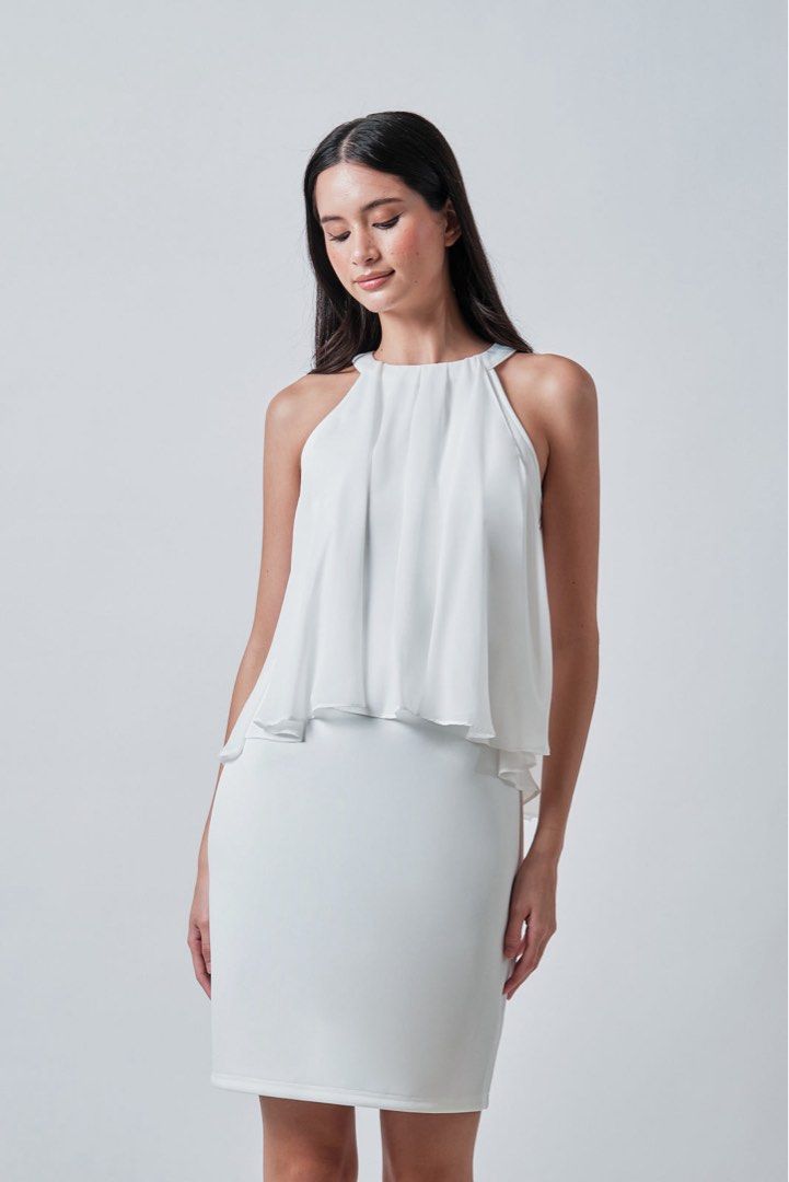 Karimadon White Cheena Dress (Category: Dresses) located in Manila. Submitted by mainedecluttering (Listing ID 1470663892, Image 2). Description: - Bought at Karimadon, SM North - Original price: ₱2,799 - Selling price: ₱1,500 - in very pristine condition - Size: Medium (fits a 28-30-inch waist) - ❕Worn only ONCE (as in ONCE 😭) for my graduation campus pictorial lang❕ - Can be styled in 2 ways: off-shoulder or halter-style - Length: Slightly abo
