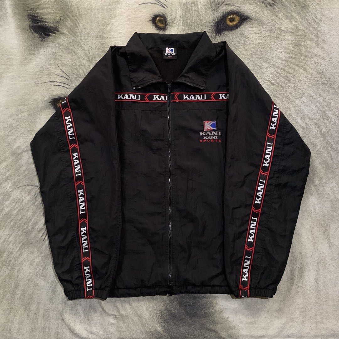 Karl Kani Jacket (Category: Coats, Jackets and Outerwear) located in Bulacan. Submitted by puronghustlin (Listing ID 1470595801, Image 1). Description: Brand: Karl Kani Sports Item: Vintage Full-Zip Nylon Track / Windbreaker Jacket Color: Black with Red, Blue, White, and Silver Graphic Embroideries & Taping Style: 90s / Y2K Hip-Hop / Streetwear / Athletic -Good Condition -25W 28L .