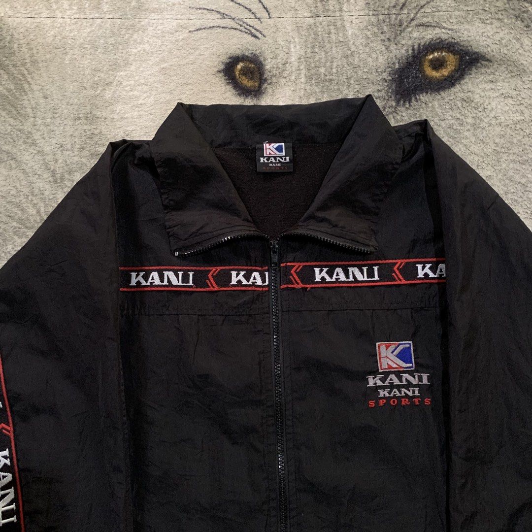 Karl Kani Jacket (Category: Coats, Jackets and Outerwear) located in Bulacan. Submitted by puronghustlin (Listing ID 1470595801, Image 2). Description: Brand: Karl Kani Sports Item: Vintage Full-Zip Nylon Track / Windbreaker Jacket Color: Black with Red, Blue, White, and Silver Graphic Embroideries & Taping Style: 90s / Y2K Hip-Hop / Streetwear / Athletic -Good Condition -25W 28L .