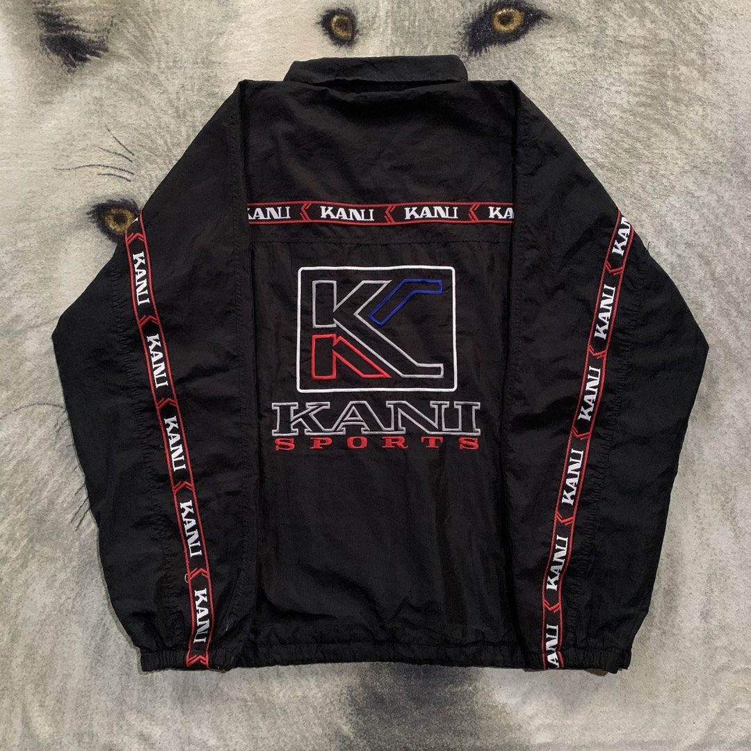 Karl Kani Jacket (Category: Coats, Jackets and Outerwear) located in Bulacan. Submitted by puronghustlin (Listing ID 1470595801, Image 3). Description: Brand: Karl Kani Sports Item: Vintage Full-Zip Nylon Track / Windbreaker Jacket Color: Black with Red, Blue, White, and Silver Graphic Embroideries & Taping Style: 90s / Y2K Hip-Hop / Streetwear / Athletic -Good Condition -25W 28L .