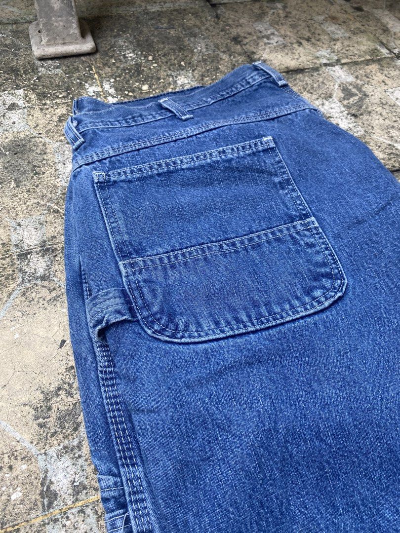 KEY Denim Carpenter Jeans Blue Workwear (Category: Jeans) located in Imus. Submitted by frootiloots4103 (Listing ID 1470717552, Image 3). Description: - Brand: KEY - Color: Dark blue wash - Style: Classic utility carpenter jeans - Fit: Traditional relaxed fit with straight legs - Features: Multiple tool pockets, side hammer loop, branded metal button closure, and reinforced stress rivets - Material: Sturdy construction built for daily wear OPEN F