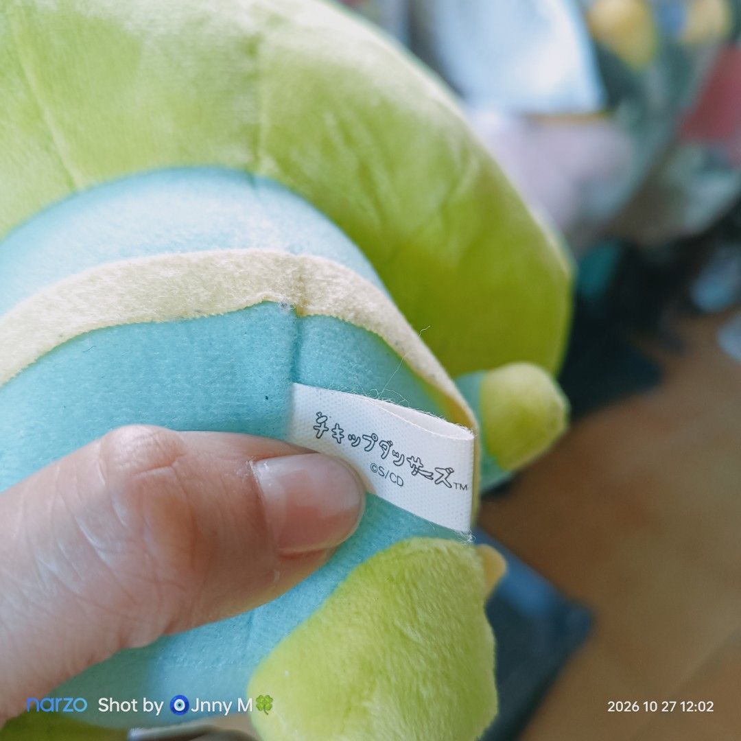 SAN-X CHIKIP DANCER Frog Plush Toy (Category: Plushies & Soft Toys) located in Taguig. Submitted by mhayestufftoys (Listing ID 1470641473, Image 2). Description: - Adorable green frog plush toy with a cheerful big smile and pink mouth - Dressed in a charming light blue shirt complete with a yellow belt - Features official Japanese character tags with copyright mark - Crafted from ultra-soft, premium fabric material - Perfect addition for plushie 