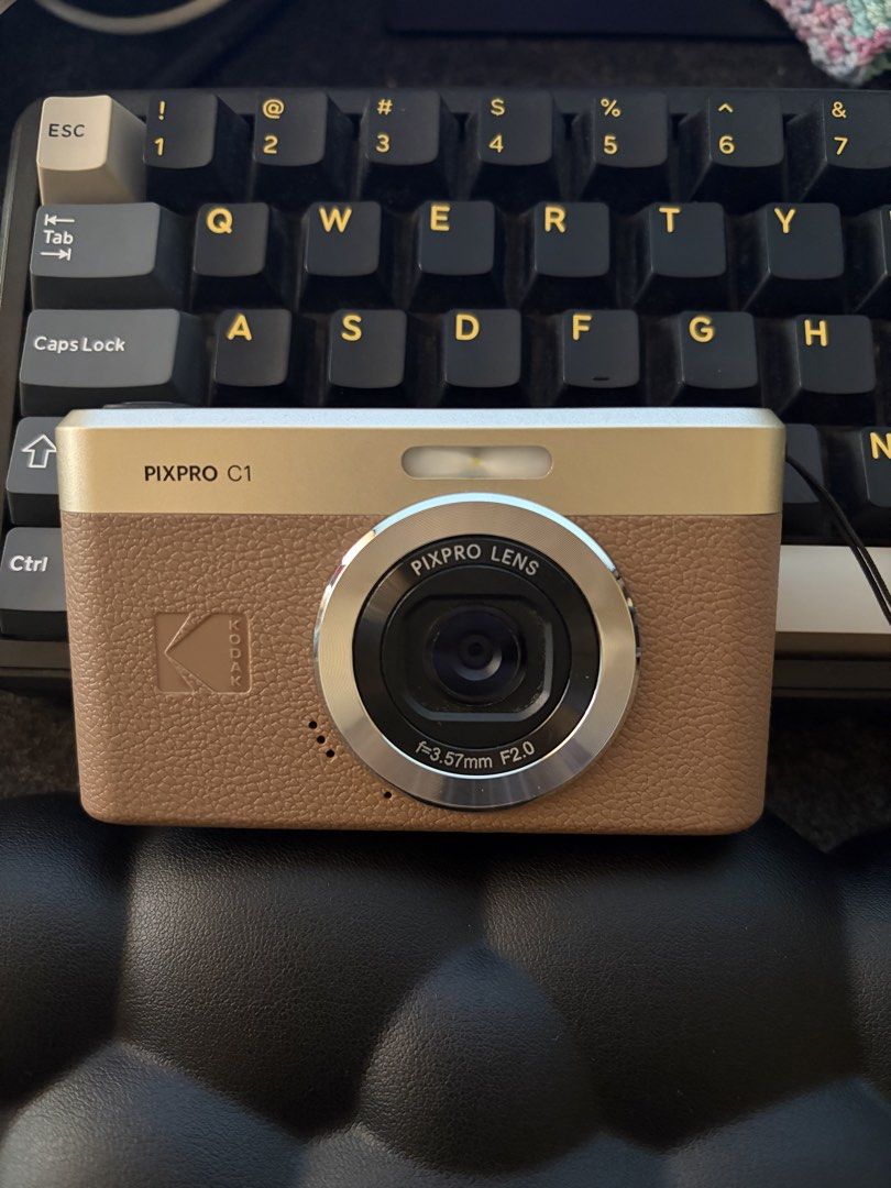 Kodak Pixpro C1 Digital Camera Brown Gold (Category: Cameras) located in Manila. Submitted by 123cheesedog (Listing ID 1470573489, Image 2). Description: - Kodak Pixpro C1 compact digital camera in chic brown with a gold top accent - Pixpro lens with f=3.57mm f/2.0 specs and built-in flash for sharp, clear shots - Convenient flip-up screen on the back for easy framing and effortless selfies - Ultra-compact size that fits easily in your pocket or 