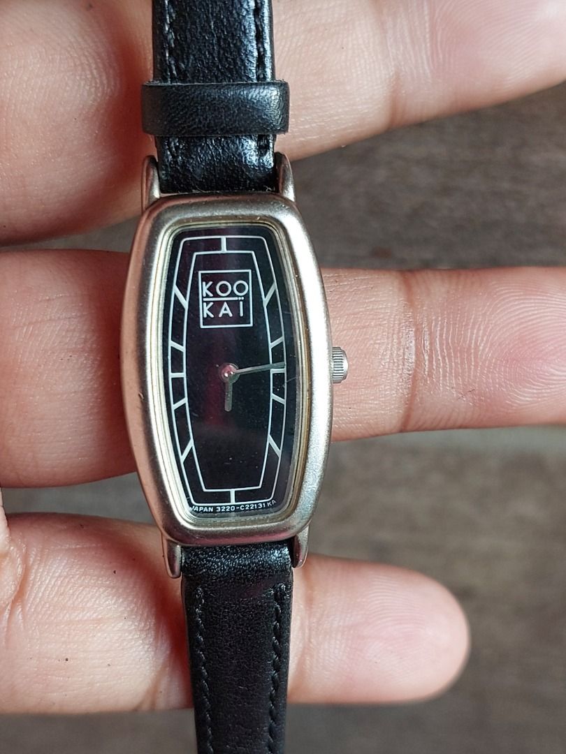 Kookai Vintage Rectangular Black Leather Watch Japan Movement (Category: Women's Watches) located in Batangas. Submitted by vintageanddainty (Listing ID 1470580629, Image 2). Description: - Brand: Kookai Vintage - Dial: Black rectangular with white index markers - Strap: Genuine black leather with silver-tone buckle - Case Back: Stainless steel base metal, stamped with model 3220-327993 YO and serial 480479 - Style: Classic minimalist, slim band,