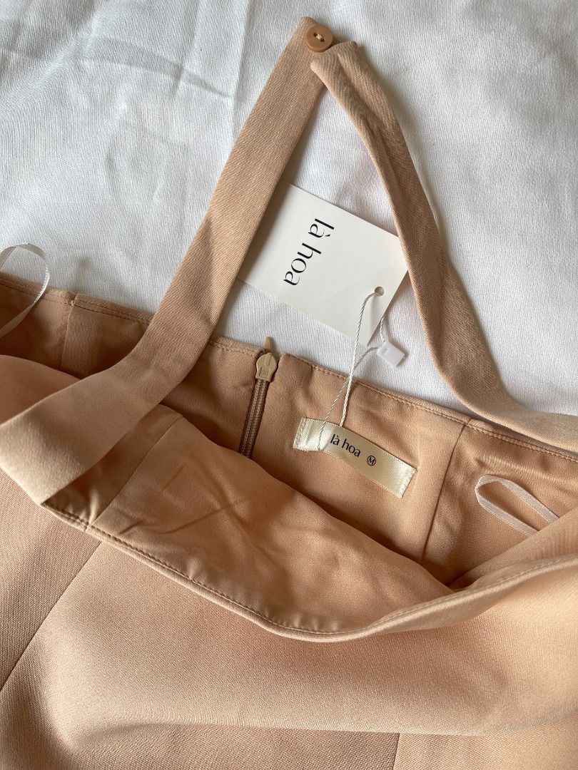 La Hoa Halter Top (Category: Sleeveless) located in Quezon City. Submitted by everythingmustgo__ (Listing ID 1470676615, Image 3). Description: La Hoa Halter Top (from Vietnam 🇻🇳) - brand new with tags - size: medium (bust 32-33" / waist 26-27") (when worn not mine) - super nice quality!! iykyk ‼️ firm with price. low ballers will not be entertained ‼️.
