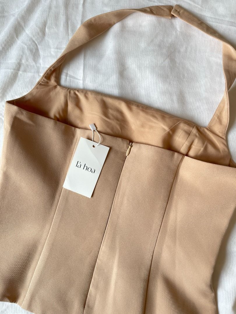 La Hoa Halter Top (Category: Sleeveless) located in Quezon City. Submitted by everythingmustgo__ (Listing ID 1470676615, Image 2). Description: La Hoa Halter Top (from Vietnam 🇻🇳) - brand new with tags - size: medium (bust 32-33" / waist 26-27") (when worn not mine) - super nice quality!! iykyk ‼️ firm with price. low ballers will not be entertained ‼️.