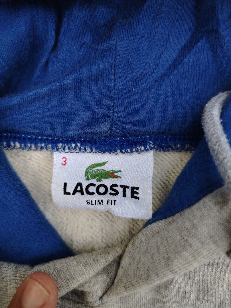 Lacoste (Category: Hoodies) located in Agdangan. Submitted by thiftace (Listing ID 1470663871, Image 3). Description: 22 by 27.