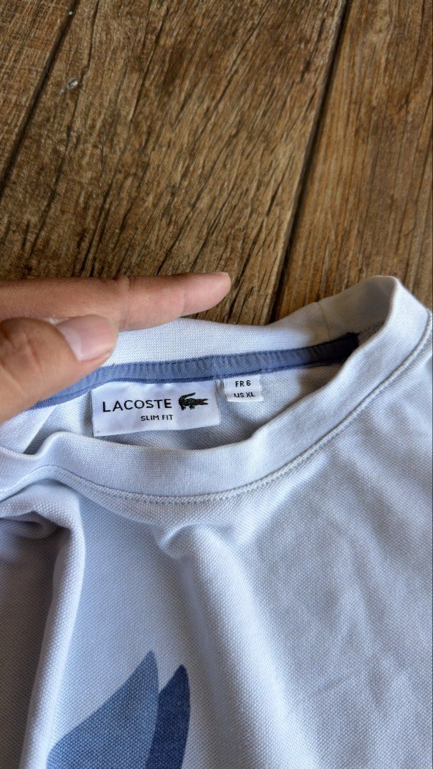 LACOSTE BIG LOGO LIGHT BLUE (Category: Shirts) located in Manila. Submitted by urban.vintage (Listing ID 1470588984, Image 3). Description: ISSUE: NONE (NEED WASH) MOP :GCASH (NO COD) SHIP VIA: LALAMOVE & J&T LOCATION: PASIG CITY LENGTH: 28 WIDTH : 24.