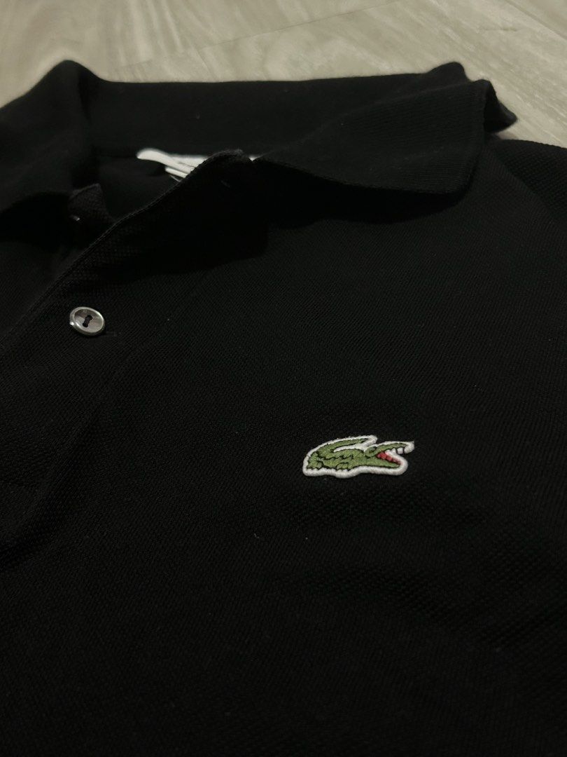Lacoste black polo (Category: Tshirts & Polo Shirts ) located in Batangas. Submitted by jazthrift_ (Listing ID 1470649028, Image 2). Description: Lacoste: - Classic fit - Color rate: 9.5/10 - Complete tags - Medium on tag (us size) 20x25 -No issues 🏷️₱1,199 (free shipping).