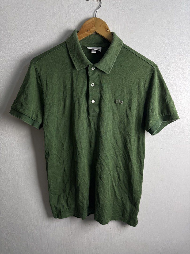 Lacoste green polo shirt (Category: Tshirts & Polo Shirts ) located in Daraga. Submitted by mirandillaadrian (Listing ID 1470706758, Image 1). Description: Authenticn Issue sign of used 19x26.5 Small men 9/10 .