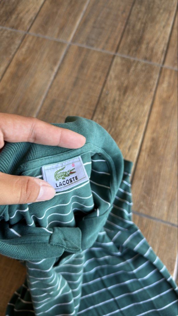 LACOSTE GREEN STRIPE POLO (Category: Shirts) located in Manila. Submitted by urban.vintage (Listing ID 1470589336, Image 3). Description: ISSUE: NONE (NEED WASH) MOP :GCASH (NO COD) SHIP VIA: LALAMOVE & J&T LOCATION: PASIG CITY LENGTH: 32 WIDTH : 24.