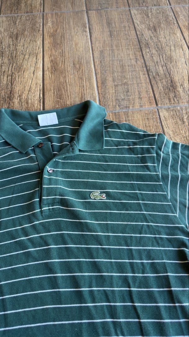 LACOSTE GREEN STRIPE POLO (Category: Shirts) located in Manila. Submitted by urban.vintage (Listing ID 1470589336, Image 2). Description: ISSUE: NONE (NEED WASH) MOP :GCASH (NO COD) SHIP VIA: LALAMOVE & J&T LOCATION: PASIG CITY LENGTH: 32 WIDTH : 24.