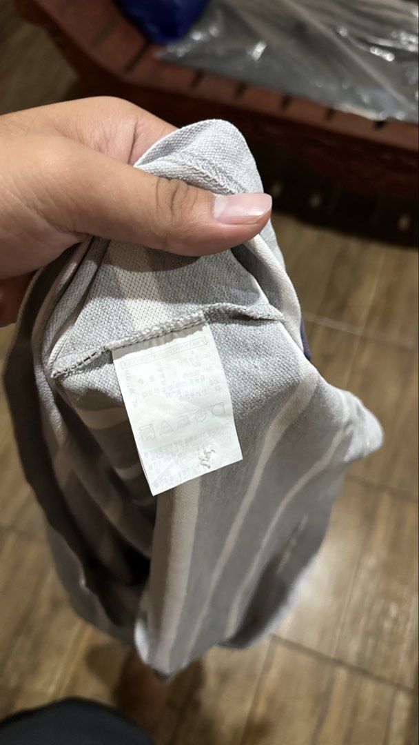 LACOSTE GREY STRIPE (Category: Tshirts & Polo Shirts ) located in Manila. Submitted by urban-vintage_2 (Listing ID 1470568770, Image 3). Description: ISSUE: PINHOLE ( NEED WASH ) MOP :GCASH ( NO COD ) SHIP VIA : LALAMOVE & J&T LOCATION : PASIG CITY LENGTH : 30 WIDTH : 19 .