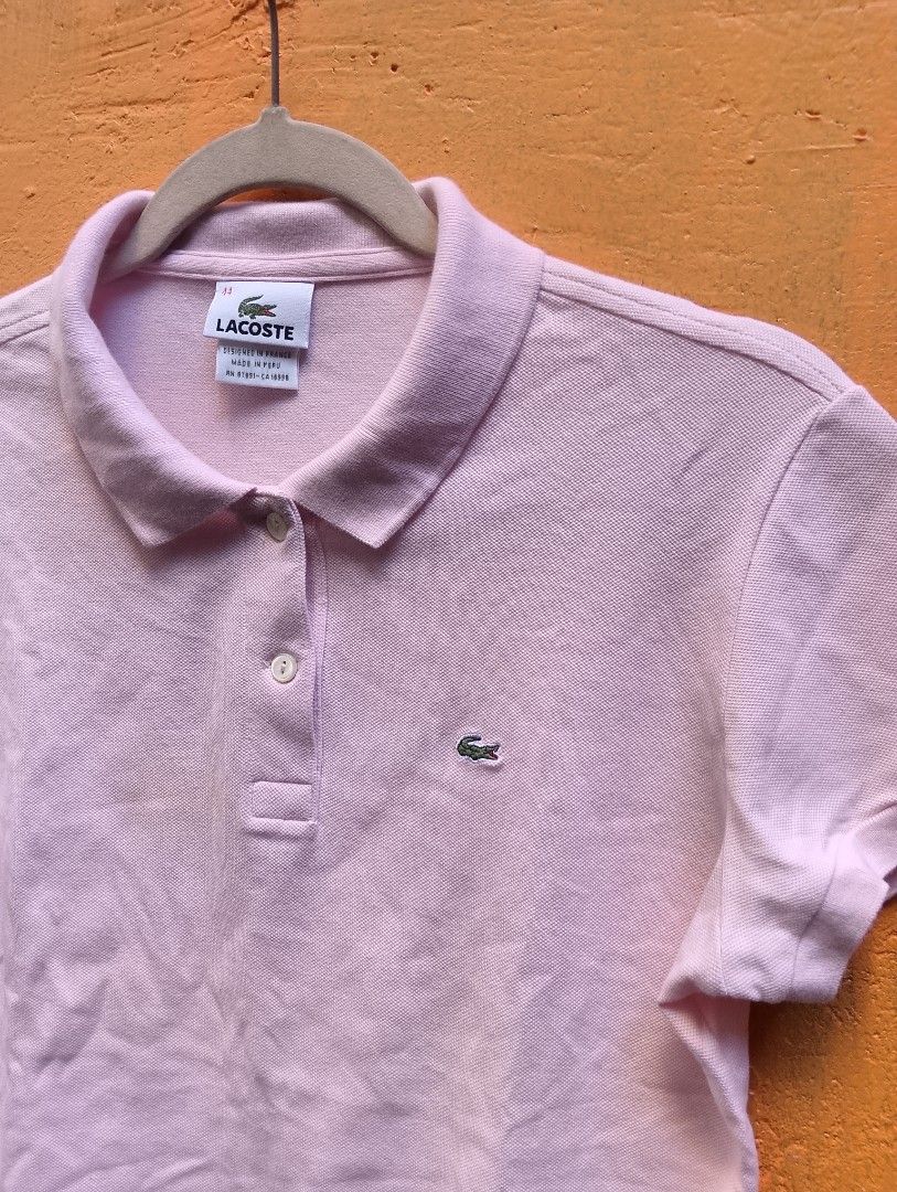 Lacoste Light Pink (Category: Shirts) located in Manila. Submitted by envy25 (Listing ID 1470630007, Image 2). Description: Lacoste Light Pinl Size 44 17x24 Dimension Excellent Condition washable stain.