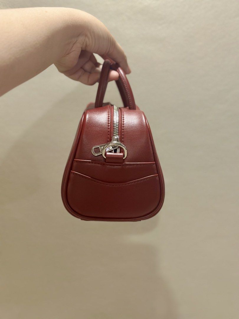 Lacoste LORA bag (Category: Cross-body Bags) located in Las Pinas. Submitted by k_archive (Listing ID 1470658434, Image 3). Description: • Lacoste LORA bag • Color: red • Size: xxs, top handle bag • Sling, guitar strap • Good as new, used only once • Bought from South Korea • Complete inclusions - paper bag, tags, dust bag.
