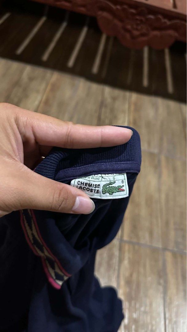 LACOSTE NAVY BLUE (Category: Tshirts & Polo Shirts ) located in Manila. Submitted by urban.vintage (Listing ID 1470602284, Image 3). Description: ISSUE: REPAIRED STITCH (NEED WASH) MOP :GCASH (NO COD) SHIP VIA: LALAMOVE & J&T LOCATION: PASIG CITY LENGTH: 32 WIDTH :24.