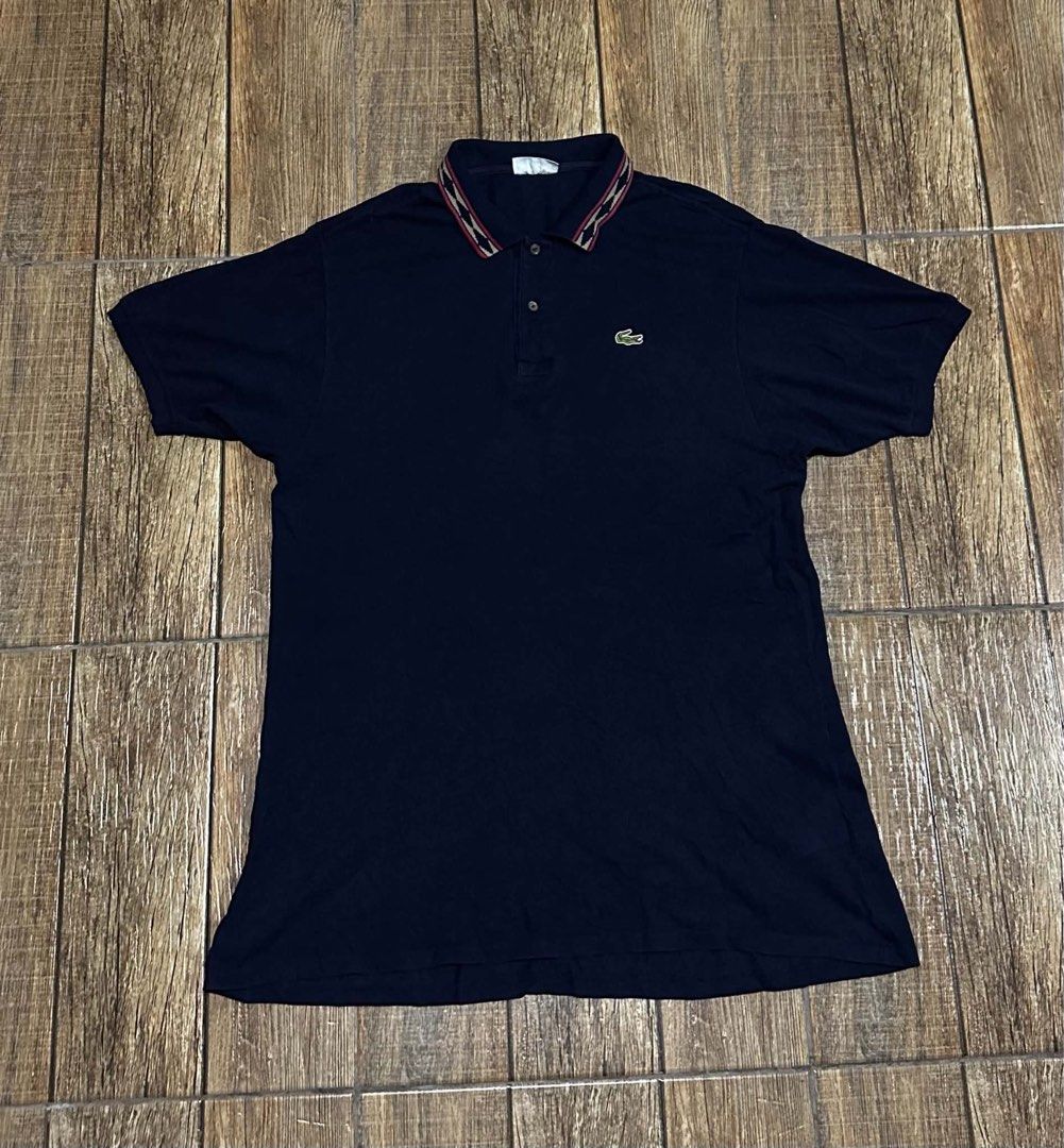 LACOSTE NAVY BLUE (Category: Tshirts & Polo Shirts ) located in Manila. Submitted by urban.vintage (Listing ID 1470602284, Image 1). Description: ISSUE: REPAIRED STITCH (NEED WASH) MOP :GCASH (NO COD) SHIP VIA: LALAMOVE & J&T LOCATION: PASIG CITY LENGTH: 32 WIDTH :24.