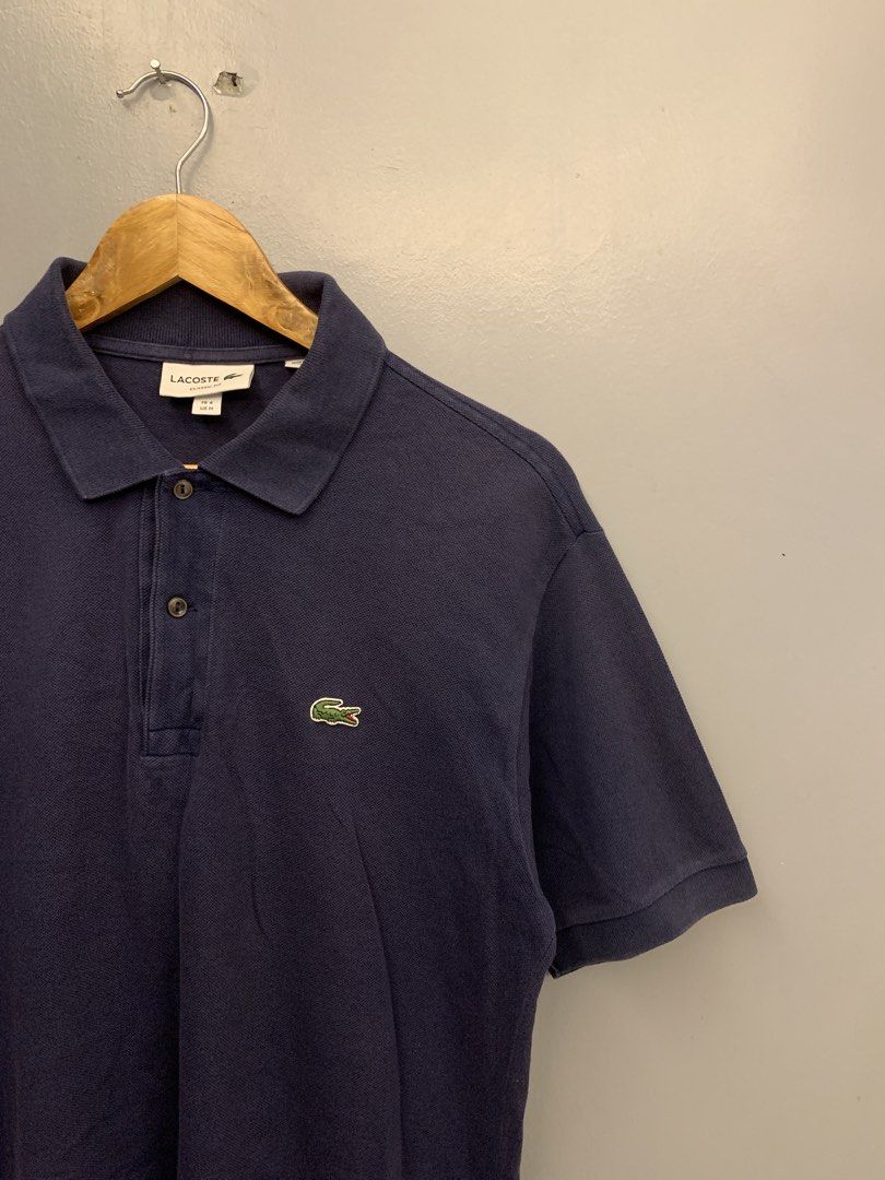 LACOSTE NAVY BLUE POLO SHIRT (Category: Tshirts & Polo Shirts ) located in Cavite. Submitted by thrift2moolah (Listing ID 1470614338, Image 2). Description: LACOSTE NAVY BLUE POLO SHIRT Size M 21/27 Excellent condition 9/10 Color rate 750 plus sf.